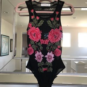 black mesh bodysuit with floral detail